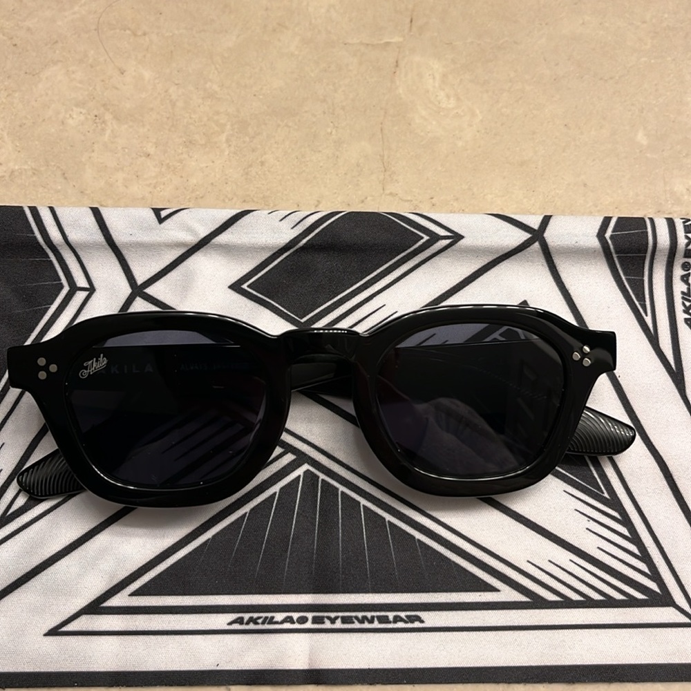 Akila Logos Sunglasses in Black
